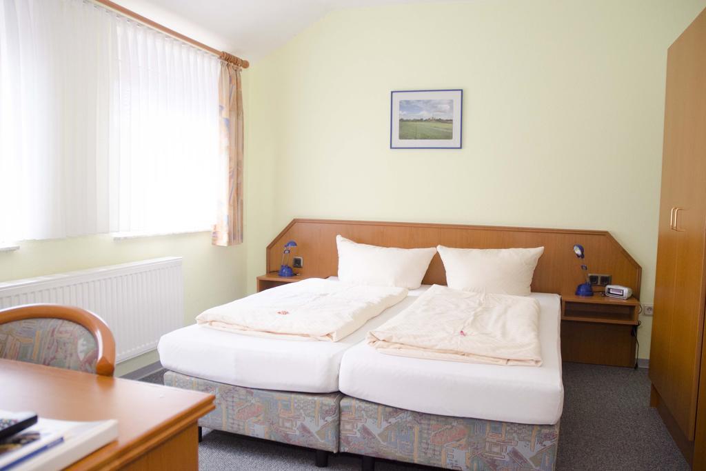 Zum Wikinger Hotel Neßmersiel Стая снимка